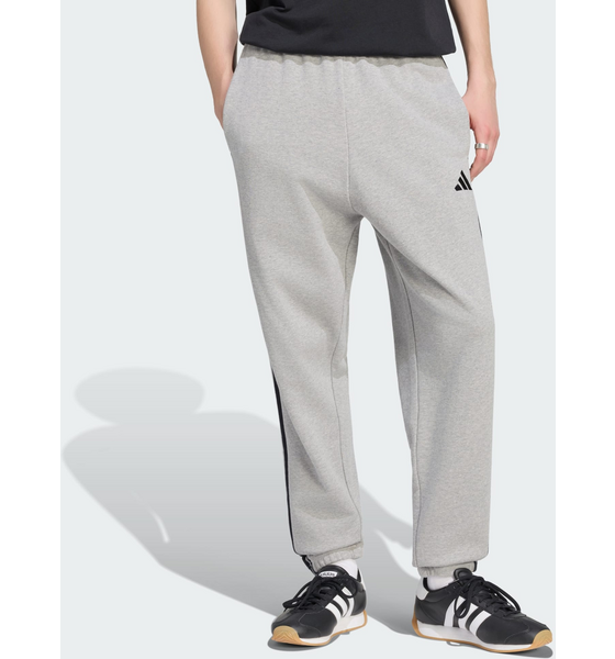 
ADIDAS, 
Adidas Essentials 3-stripes Byxor I Sweatshirttyg Med Avsmalnande Passform Och Muddar, 
Detail 1
