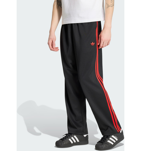 
ADIDAS ORIGINALS, 
Adidas Originals Adicolor Tr&auml;ningsbyxor Med L&ouml;s Passform, 
Detail 1
