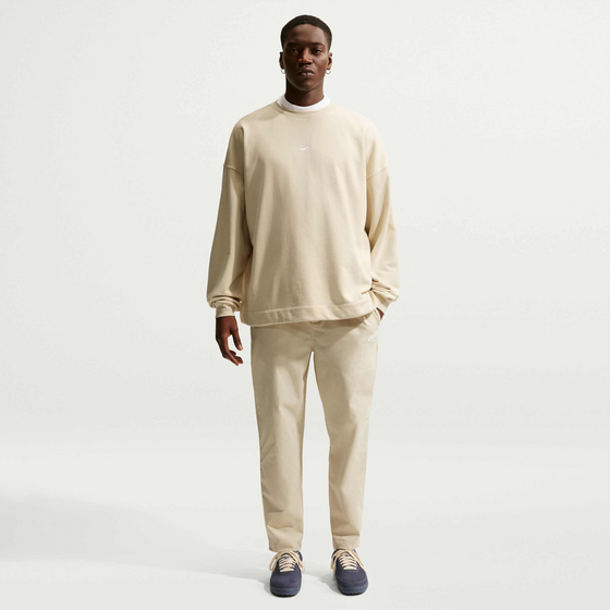 
NIKE, 
Men's Woven Tapered Trousers Club, 
Detail 1
