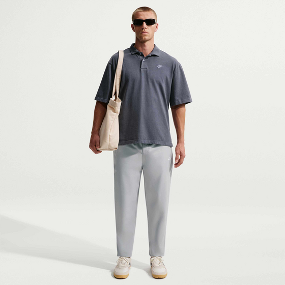 
NIKE, 
Men's Woven Tapered Trousers Club, 
Detail 1
